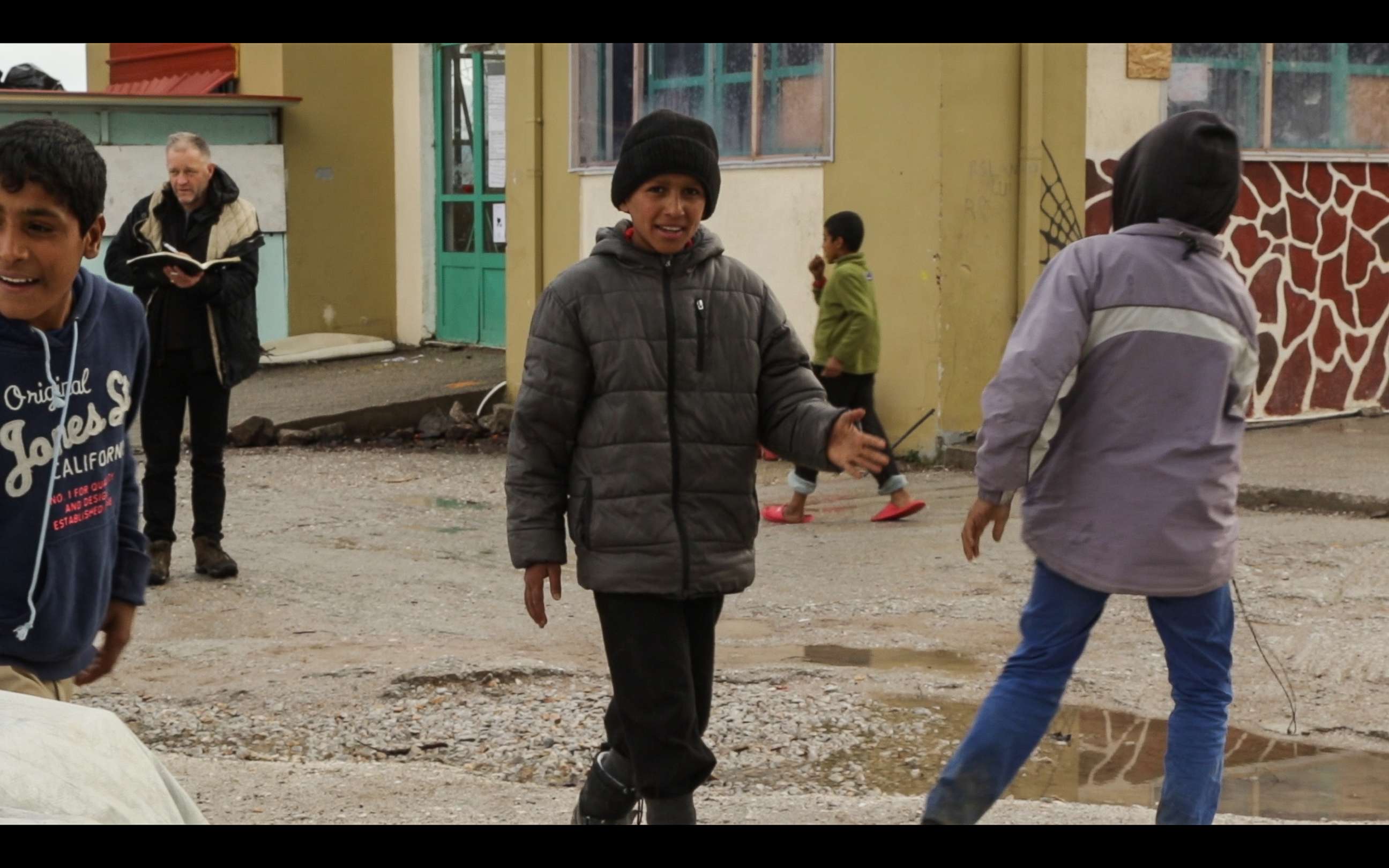 PHOTO: Mahmoud Tarrak Emhemd, 14, walks in a play area for refugees on the Greek island of Lesbos.