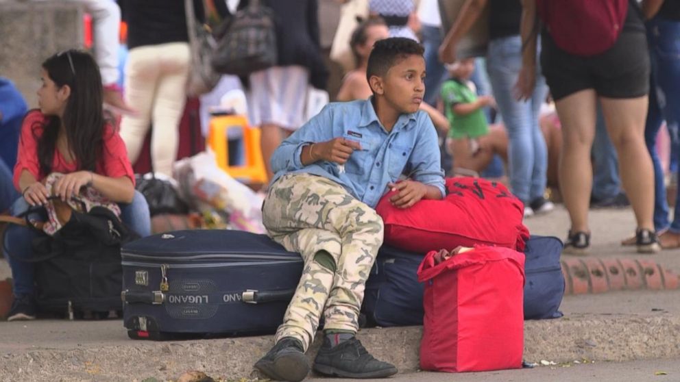 PHOTO: A Venezuelan boy guards bags at the Simon Bolivar International Bridge in Cucuta, Colombia. More than 2 million Venezuelans have fled misery in their country in the past few years.