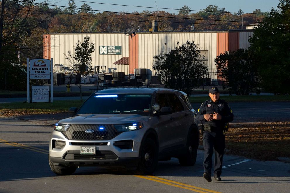 PHOTO: A Maine state trooper guards the entrance to a recycling facility where law enforcement found the body of Robert Card, the suspect in this week's mass shootings, on Oct. 28, 2023, in Lisbon Falls, Maine.