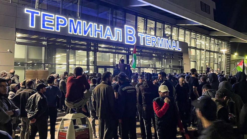 PHOTO: Local people are seen during a pro-Palestinian rally at the Makhachkala Airport in Russia after the arrival of a scheduled flight from Tel Aviv on Oct. 29, 2023.