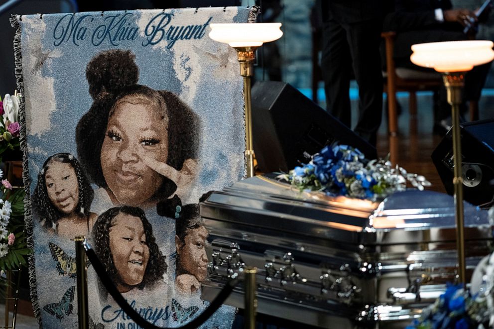 PHOTO: A banner with portraits of Ma'Khia Bryant, a Black teenage girl fatally shot by police, is displayed next to her casket during her funeral in Columbus, Ohio, April 30, 2021.
