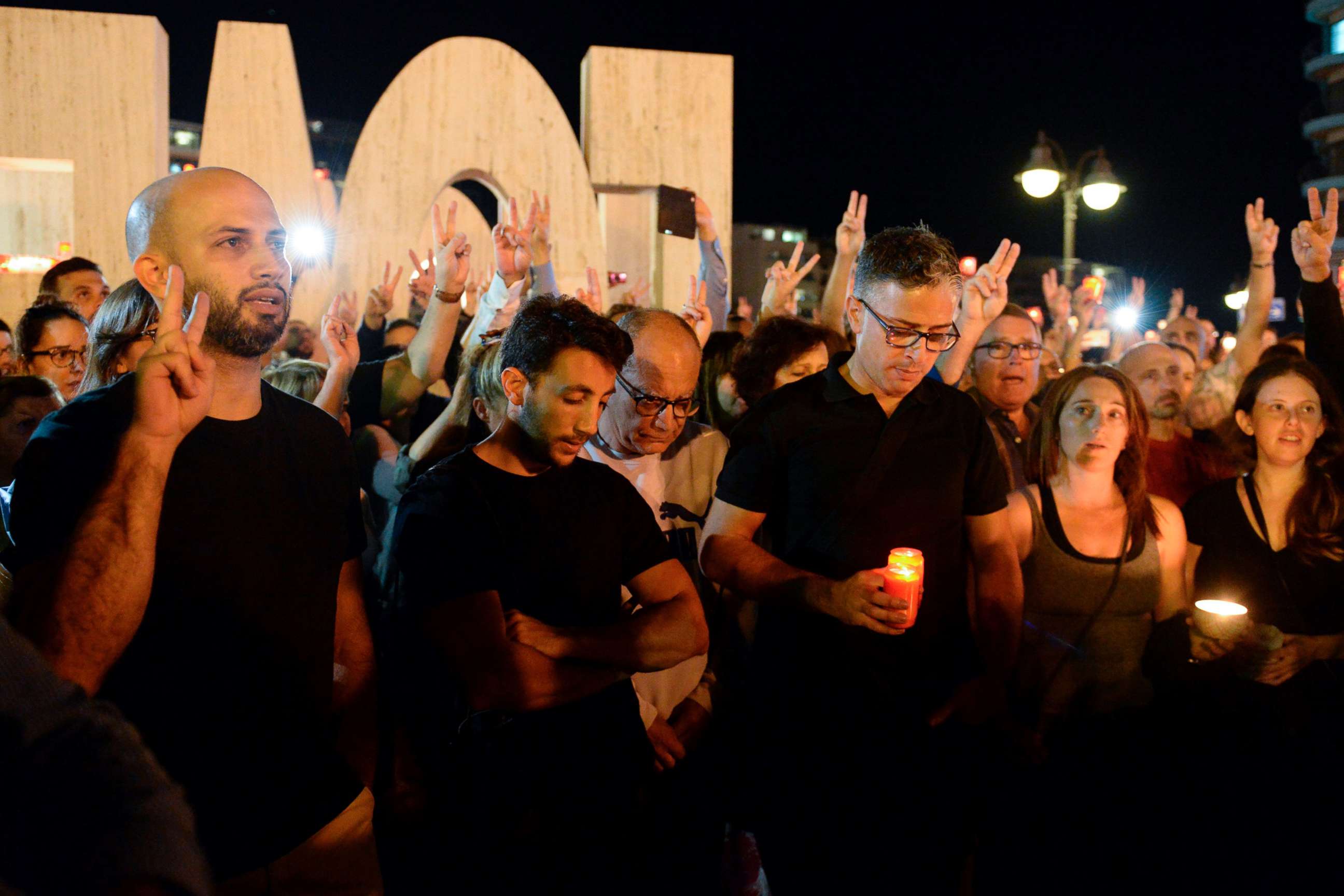 PHOTO: Thousands of people gather for a candlelight vigil in Sliema, Oct. 16, 2017, in tribute to late journalist Daphne Caruana Galizia who was killed by a car bomb close to her home in Bidnija, Malta.