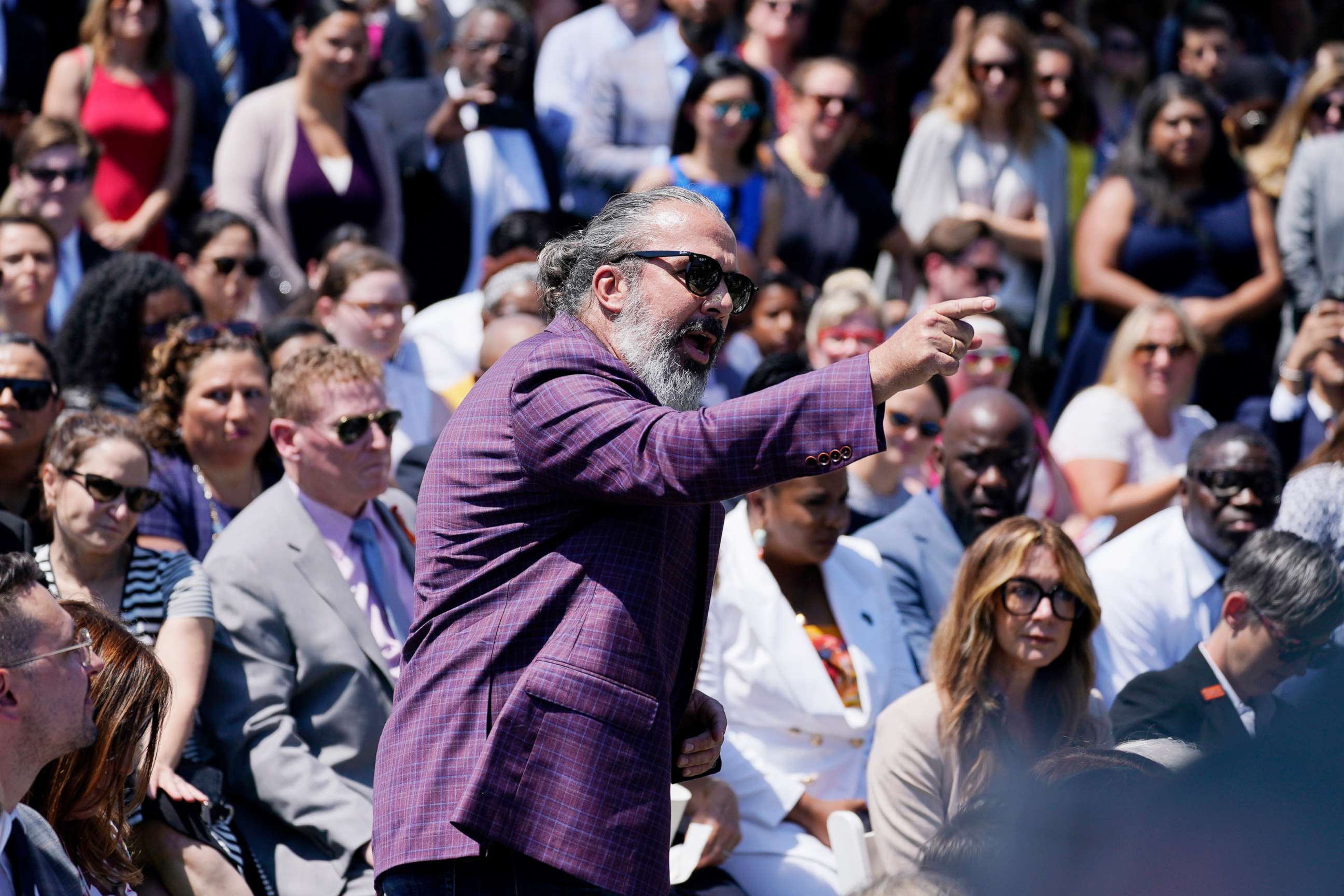 PHOTO: Manuel Oliver interrupts President Joe Biden's remarks during an event on the White House South Lawn to commemorate the Bipartisan Safer Communities Act, to help curb gun violence, July 11, 2022 in Washington.