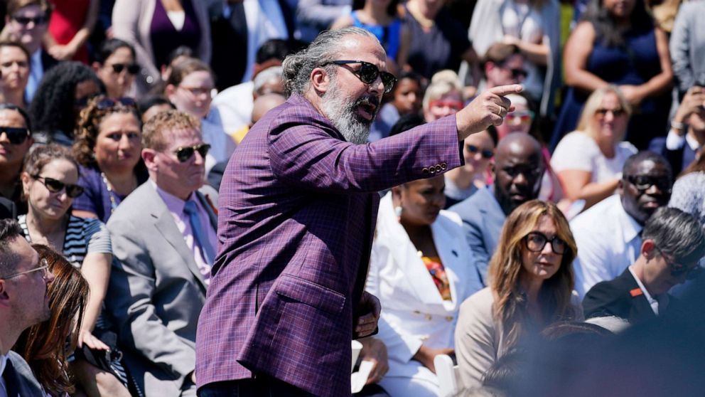 PHOTO: Manuel Oliver interrupts President Joe Biden's remarks during an event on the White House South Lawn to commemorate the Bipartisan Safer Communities Act, to help curb gun violence, July 11, 2022 in Washington.