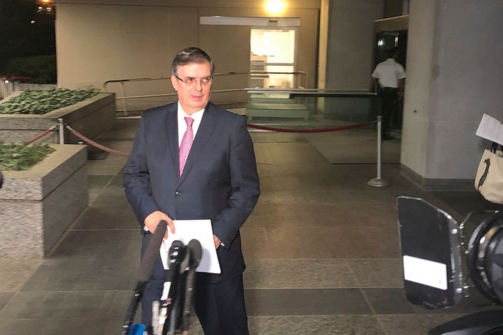 PHOTO: Mexican Foreign Minister Marcelo Ebrard gets ready to talk to reporters as he leaves the Department of State in Washington, on Friday June 7, 2019.