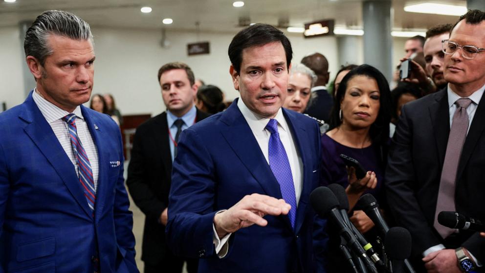 PHOTO: Secretary of State Marco Rubio, next to Defense Secretary Pete Hegseth, speaks to the media on the day of a briefing for the House of Representatives on the situation in Venezuela, on Capitol Hill in Washington, January 7, 2026. 