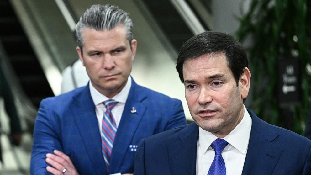 PHOTO: Secretary of State Marco Rubio, next to Defense Secretary Pete Hegseth, speaks to the media on the day of a briefing for the House of Representatives on the situation in Venezuela, on Capitol Hill in Washington, January 7, 2026. 