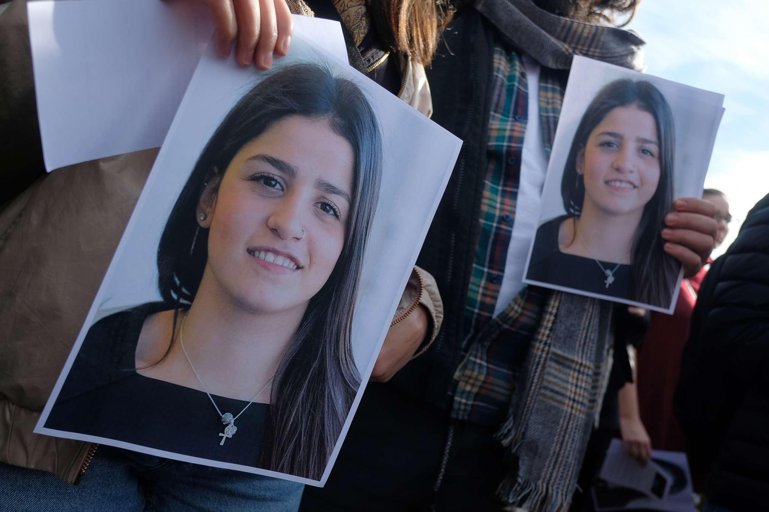 PHOTO: Students from Bard College hold up a photograph of their classmate Sara Mardini, a Syrian refugee who is being held in Greece on charges of people smuggling and spying, during a demonstration to demand her release, Oct. 20, 2018, in Berlin. 