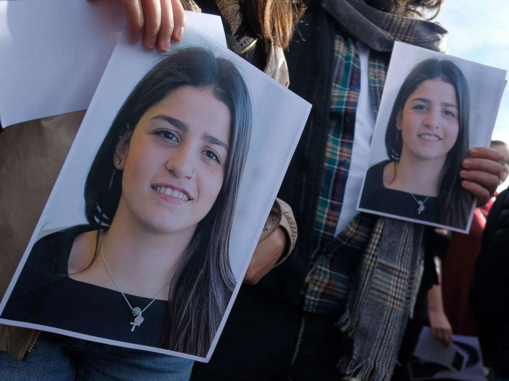 PHOTO: Students from Bard College hold up a photograph of their classmate Sara Mardini, a Syrian refugee who is being held in Greece on charges of people smuggling and spying, during a demonstration to demand her release, Oct. 20, 2018, in Berlin.