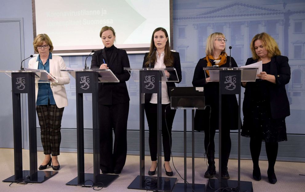PHOTO: Prime Minister Sanna Marin, center, speaks during a a press conference to present new measures to limit the spread of the novel coronavirus in Helsinki, Finland, March 16, 2020. 