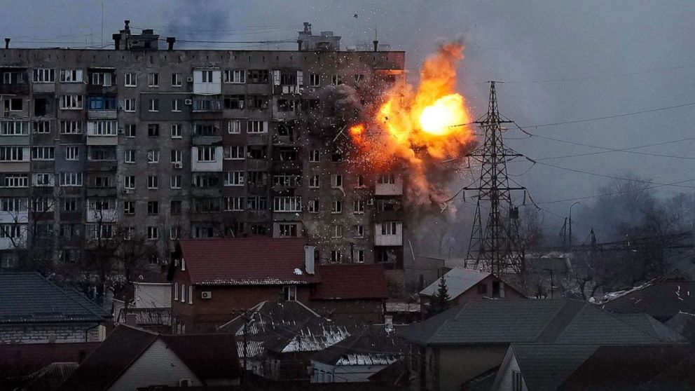 PHOTO: An explosion is seen in an apartment building after a Russian tank fires in Mariupol, Ukraine, March 11, 2022.