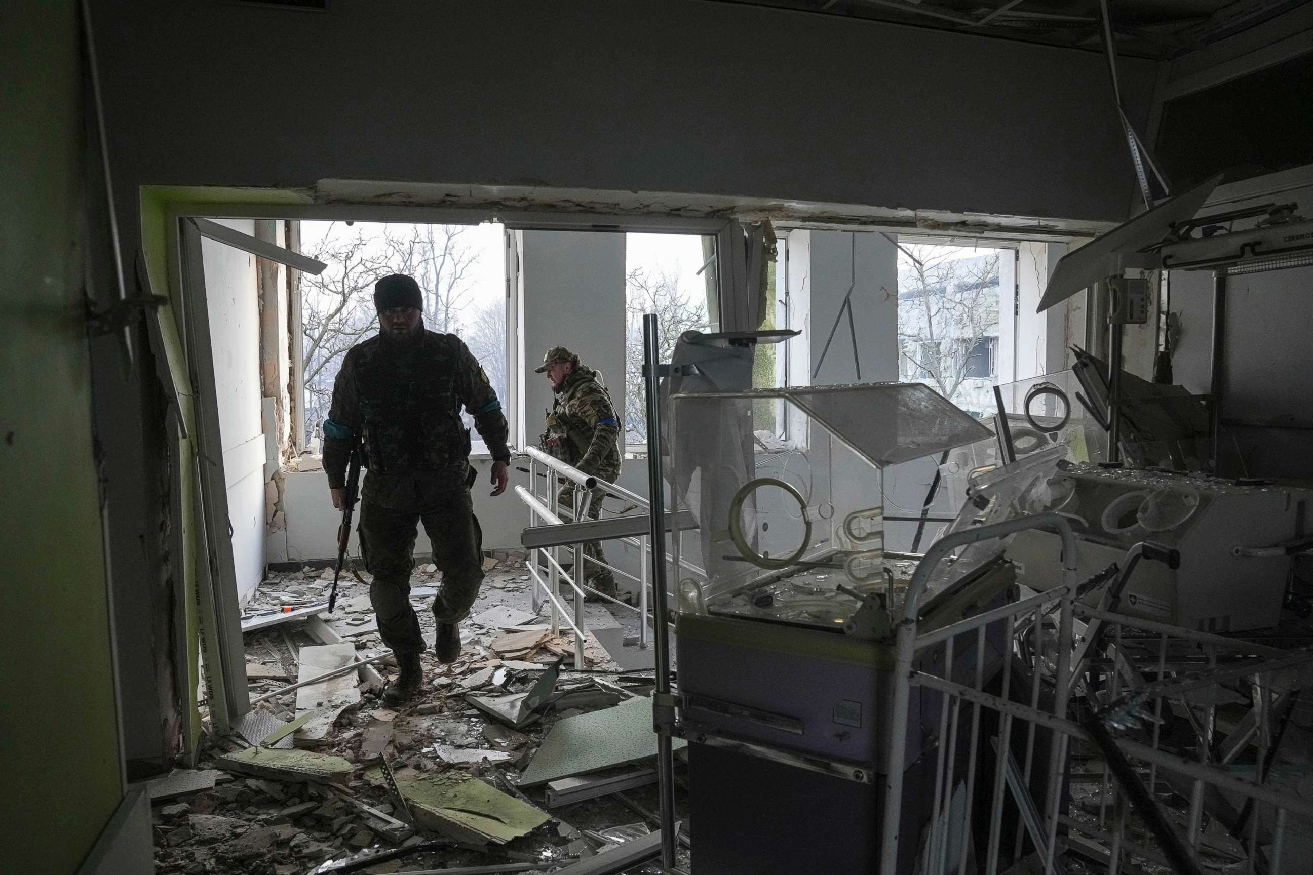 PHOTO: Ukrainian servicemen search the damaged maternity hospital in Mariupol, Ukraine, March 9, 2022.