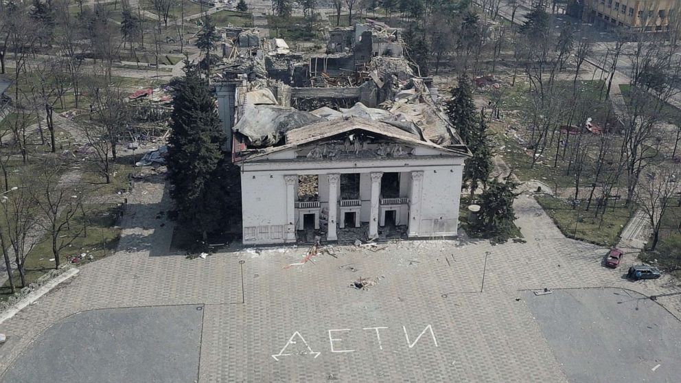 FILE PHOTO: A view from a drone shows the Donetsk Academic Regional Drama Theater destroyed in the course of Russia's war on Ukraine, with the Russian word for "children" written on the pavement, in Mariupol, southeastern Ukraine, April 10, 2022.