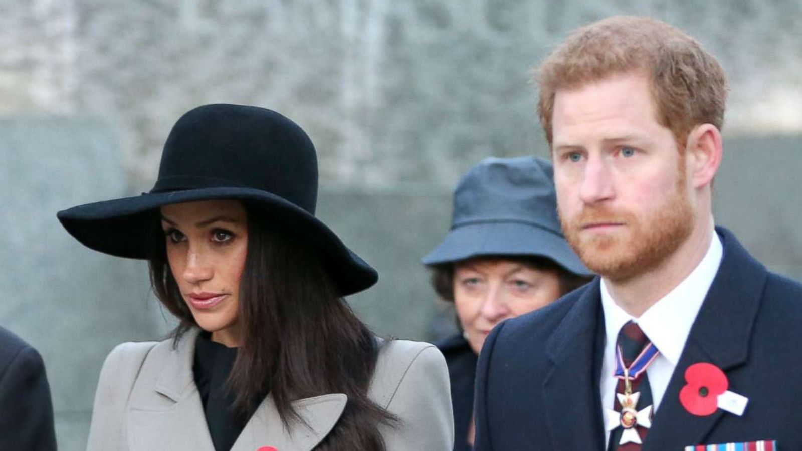 PHOTO: Prince Harry (2R) and Meghan Markle attend an Anzac Day dawn service at Hyde Park Corner, April 25, 2018, in London.