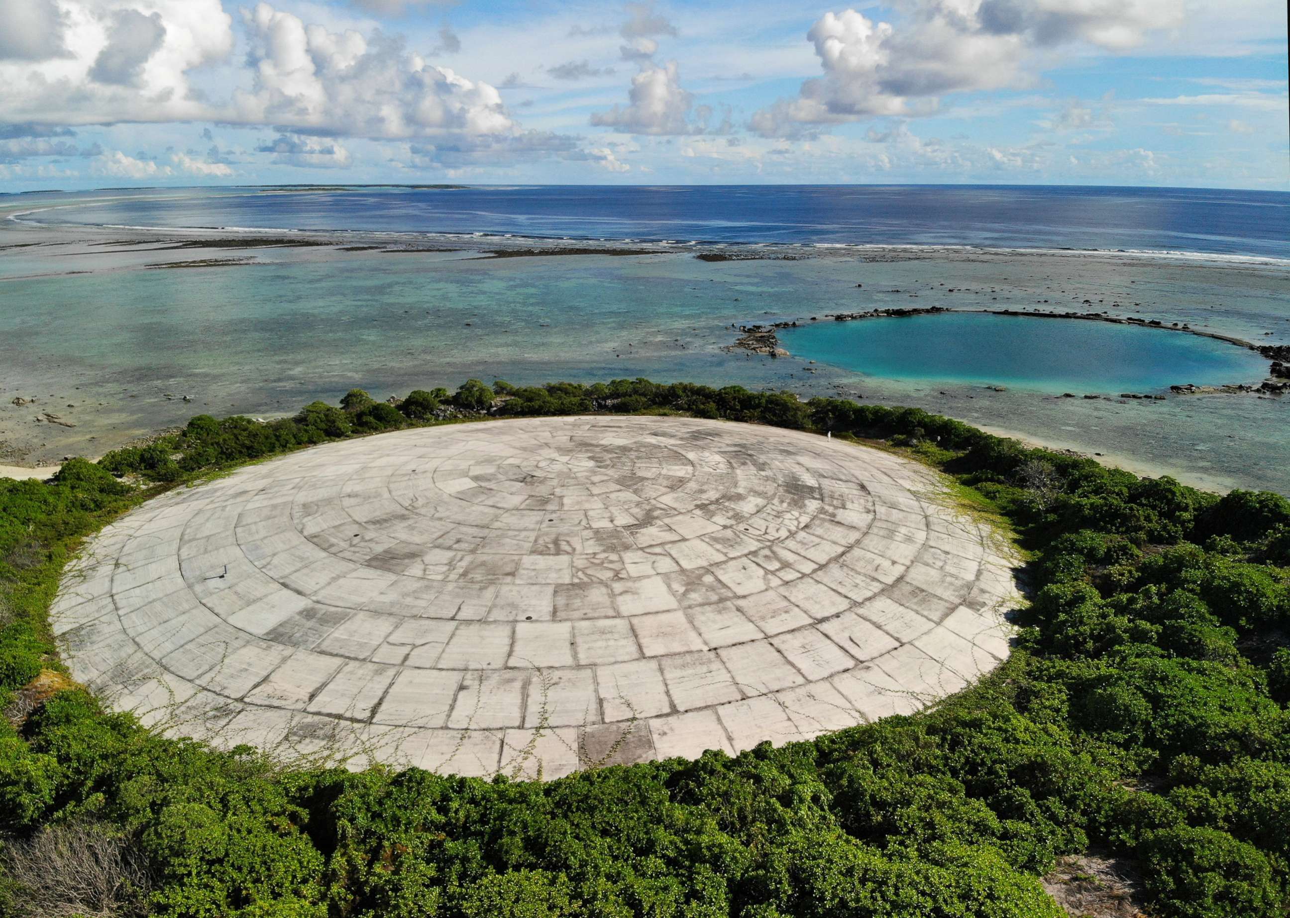 PHOTO: In this May 27, 2019, file photo, Runit Island, part of the Marshall Islands is shown. The U.S. Department of Energy has disclosed high levels of radiation in giant clams in a lagoon near the Runit Dome, where the U.S. entombed radioactive waste. 