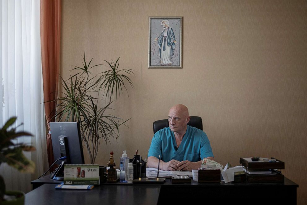 PHOTO: Doctor Ivan Tsyganok, 56, sits at his desk inside Pokrovsk maternity hospital, Donetsk region, eastern Ukraine, June 28, 2022.