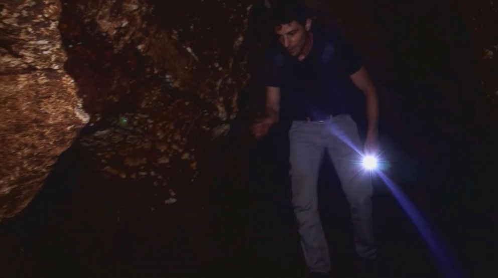 PHOTO: ABC News' chief national correspondent Matt Gutman traverses a cave near where 12 boys and their soccer coach were trapped for 16 days.