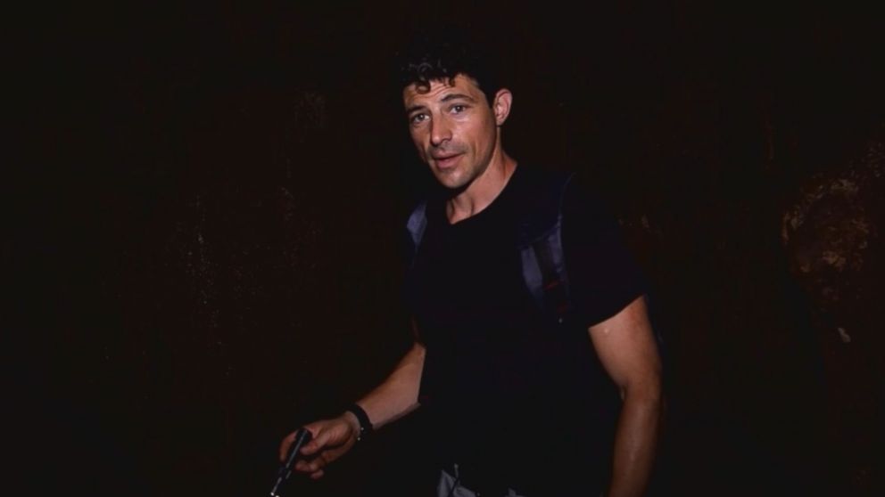 PHOTO: ABC News' chief national correspondent Matt Gutman traverses a cave near where 12 boys and their soccer coach were trapped for 16 days.