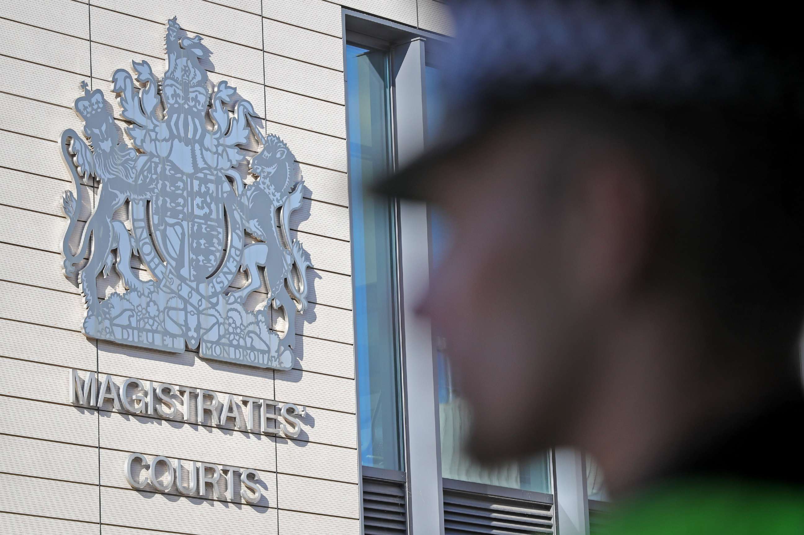 PHOTO: Police outside Chelmsford Magistrates' Court, Essex, where lorry driver Maurice Robinson, 25, is due to appear in court in Britain on Oct. 28, 2019.
