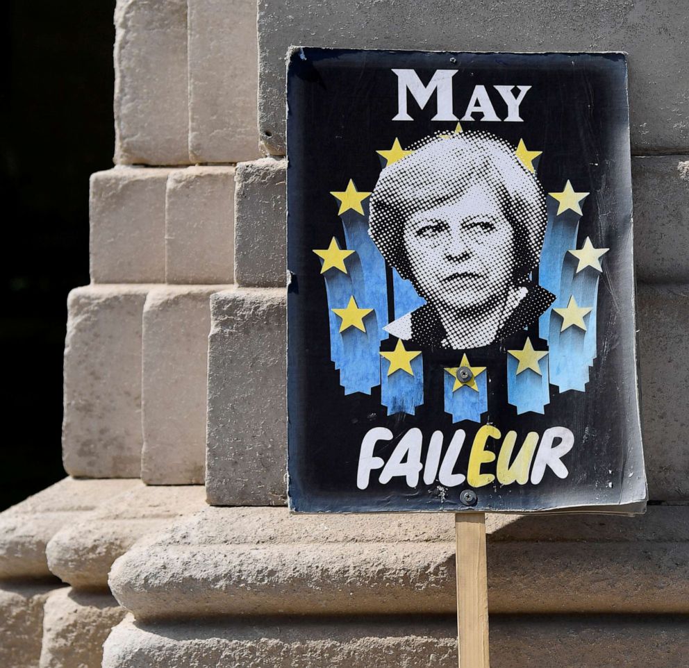 PHOTO: An anti-Brexit placard depicting Britains Prime Minister Theresa May near the Houses of Parliament in London, May 16, 2019.
