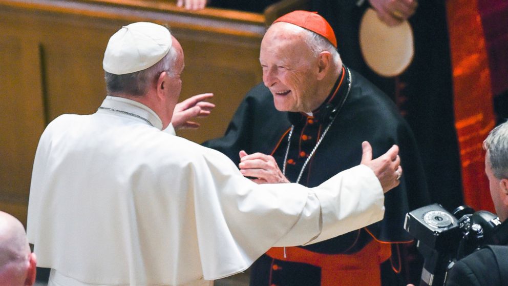 In this Sept. 23, 2015 file photo, Pope Francis reaches out to hug Cardinal Archbishop emeritus Theodore McCarrick after the Midday Prayer of the Divine with more than 300 U.S. Bishops at the Cathedral of St. Matthew the Apostle in Washington.
