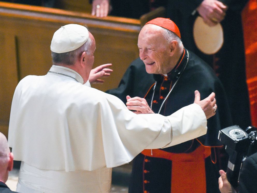 In this Sept. 23, 2015 file photo, Pope Francis reaches out to hug Cardinal Archbishop emeritus Theodore McCarrick after the Midday Prayer of the Divine with more than 300 U.S. Bishops at the Cathedral of St. Matthew the Apostle in Washington.