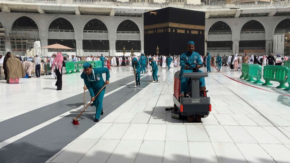 PHOTO: Workers clean the Grand Mosque, during the minor pilgrimage, known as Umrah, in the Muslim holy city of Mecca, Saudi Arabia, March 2, 2020.