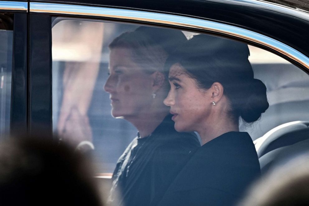 PHOTO: Britain's Sophie, Countess of Wessex  and Meghan, Duchess of Sussex are driven behind the coffin of Queen Elizabeth II, during a procession from Buckingham Palace to the Palace of Westminster, in London, Sept. 14, 2022. 