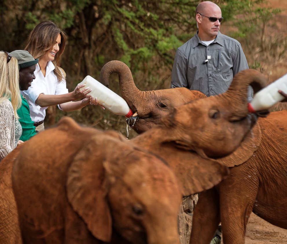 PHOTO: First lady Melania Trump feeds a baby elephant milk at the David Sheldrick Wildlife Trust Elephant Orphanage in Nairobi, Kenya, Oct. 5, 2018.