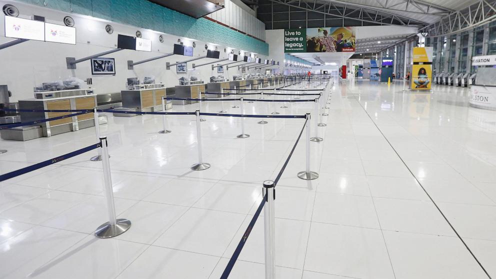 PHOTO: Empty counters at the airport, in preparation for the arrival of Hurricane Melissa, in Kingston
