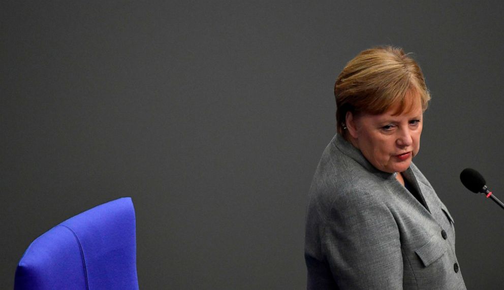 PHOTO: German Chancellor Angela Merkel addresses MPs during a question time at the Bundestag (lower house of parliament) on Dec. 18, 2019 in Berlin.