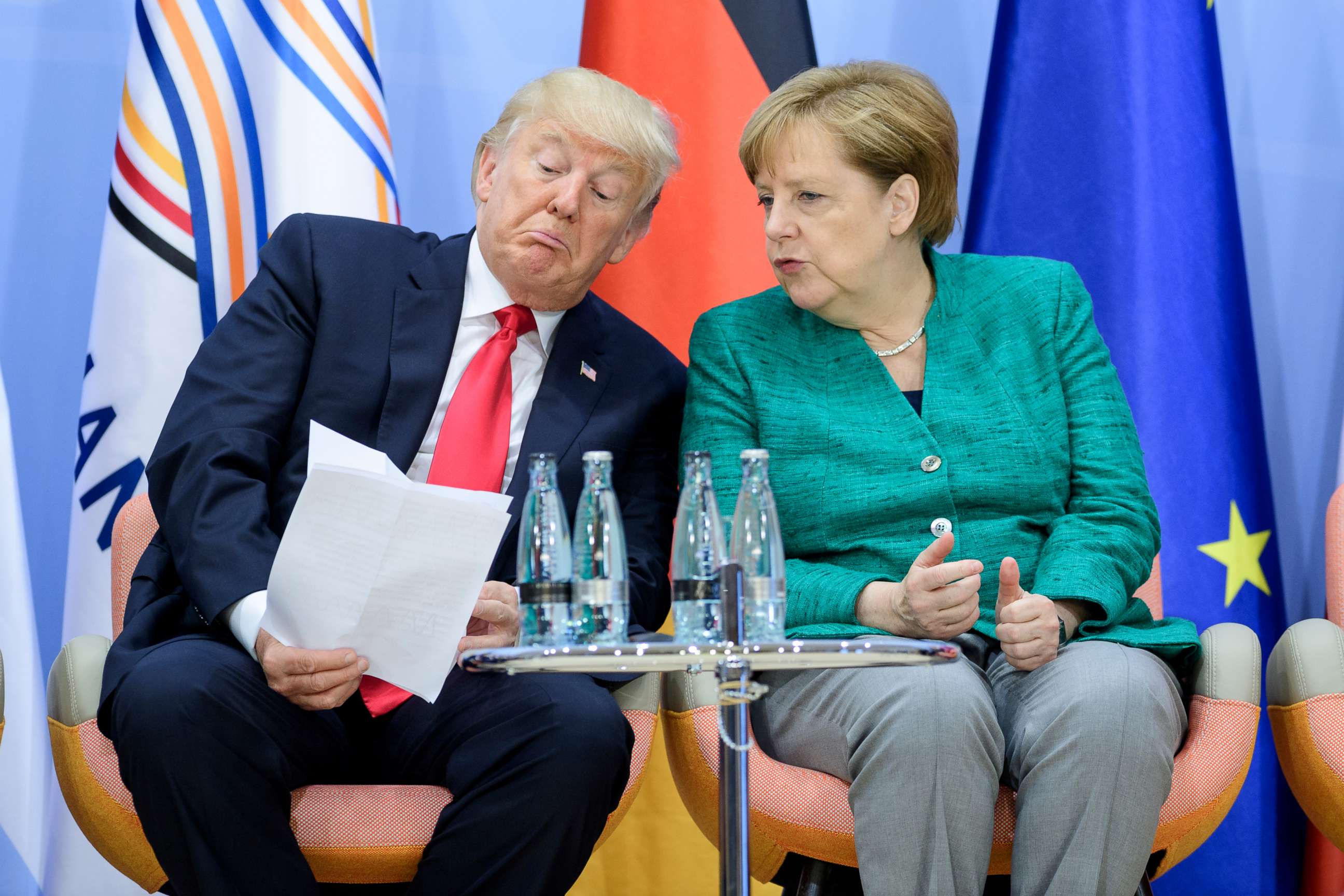PHOTO: President Donald Trump and German Chancellor Angela Merkel attend a panel discussion on the second day of the G20 summit, July 8, 2017 in Hamburg, Germany.