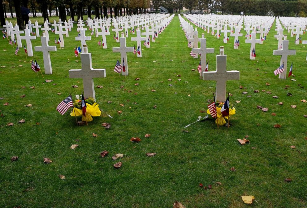 PHOTO: Gravestones are decorated with American flags at the Meuse-Argonne American Cemetery and Memorial in Romagne-sous-Montfaucon, France, Sept. 23, 2018, after a commemoration ceremony marking the 100th anniversary of the Meuse-Argonne Offensive.