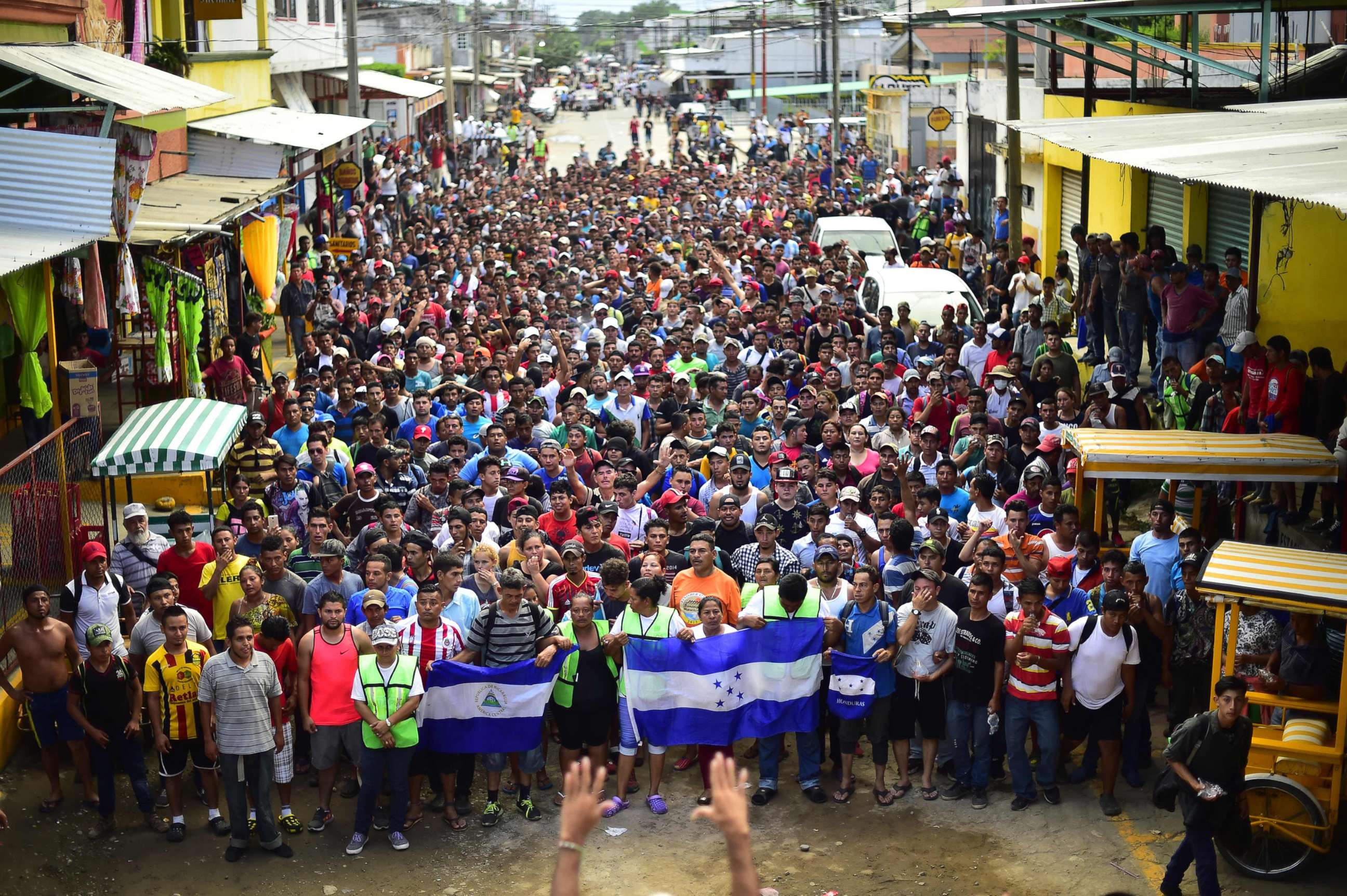 PHOTO: Honduran migrants heading in a caravan to the U.S., hold a demonstration demanding authorities to allow the rest of the group to cross, in Ciudad Hidalgo, Chiapas, Mexico after crossing from Guatemala, on Oct. 20, 2018.