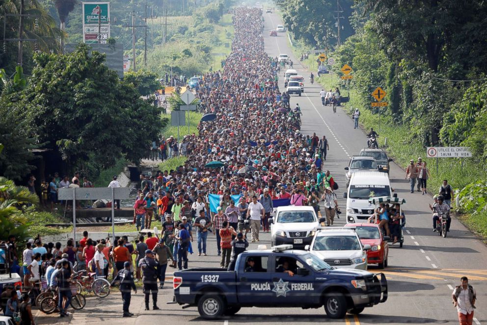 PHOTO: Central American migrants walk along the highway near the border with Guatemala, as they continue their journey trying to reach the U.S., in Tapachula, Mexico Oct. 21, 2018.