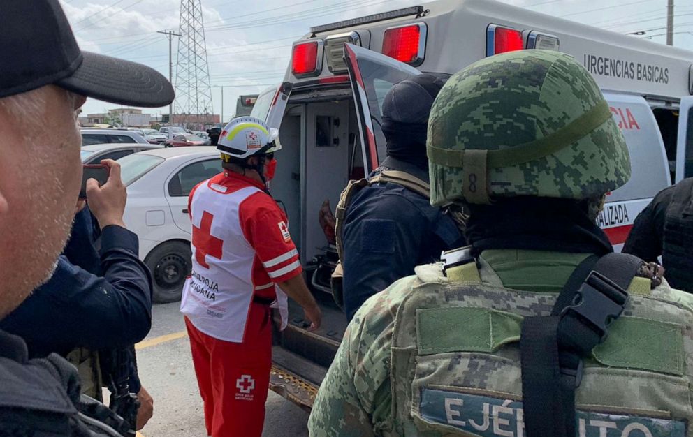 PHOTO: In this March 7, 2023, file photo, a Red Cross worker closes the door of an ambulance carrying two Americans found alive after their abduction in Mexico last week, in Matamoros, Mexico.