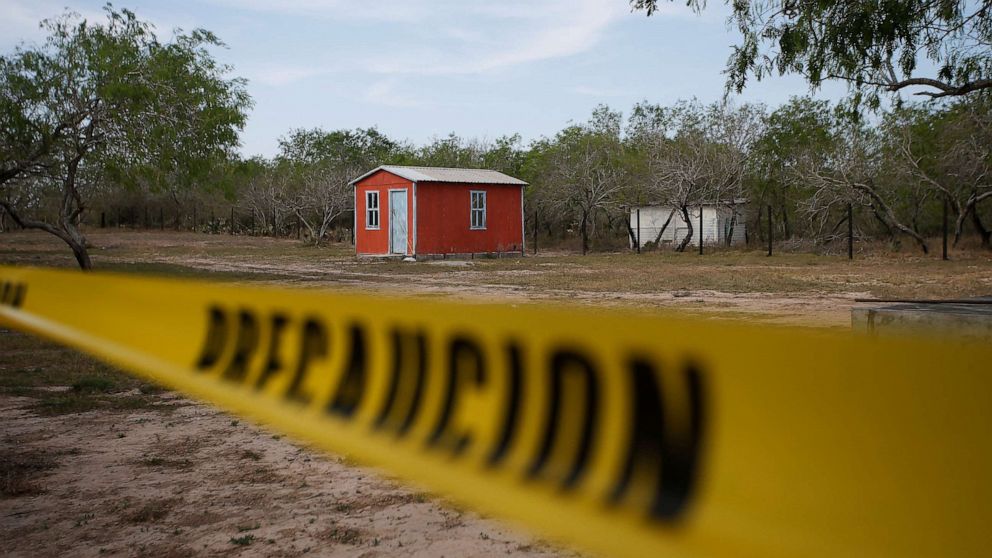 PHOTO: A general view of a storage shed behind a police cordon, at the scene where authorities found the bodies of two of four Americans kidnapped by gunmen, in Matamoros, Mexico, March 7, 2023.