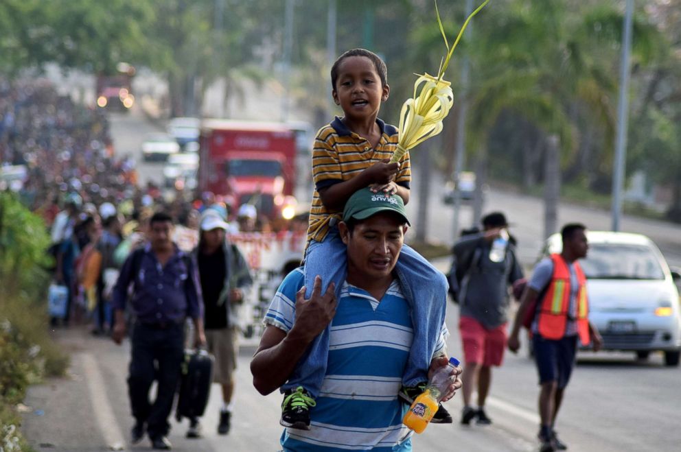 PHOTO: Hundreds of Central Americans attend a mass before they begin a Via Crucis on Palm Sunday demanding respect for their human rights, asylum and reports of violence in their countries in Tapachula, Mexico March 25, 2018.