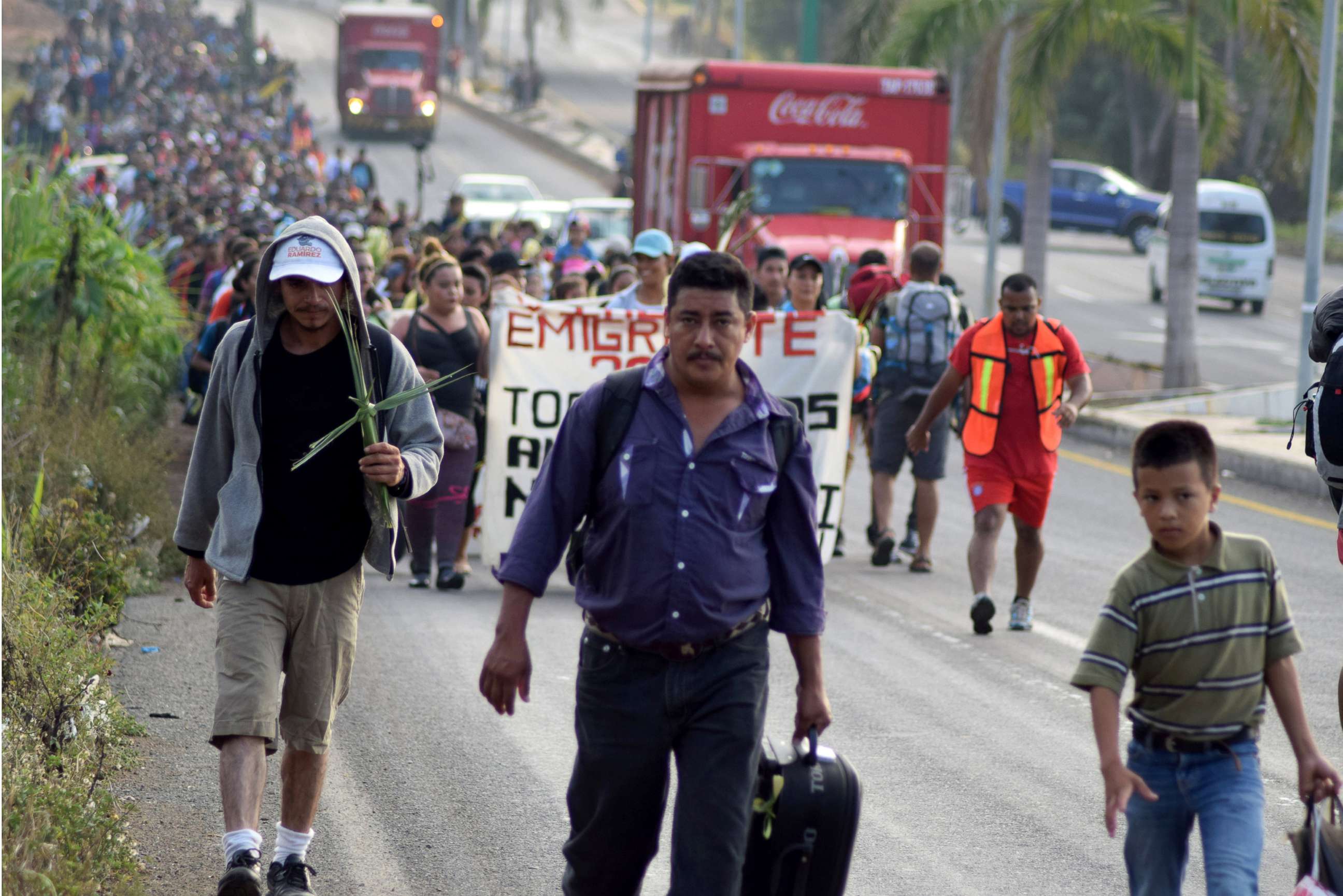 PHOTO: Hundreds of Central Americans attend a mass before they begin a Via Crucis on Palm Sunday, demanding respect for their human rights, asylum and reports of violence in their countries in Tapachula, Mexico, March 25, 2018.