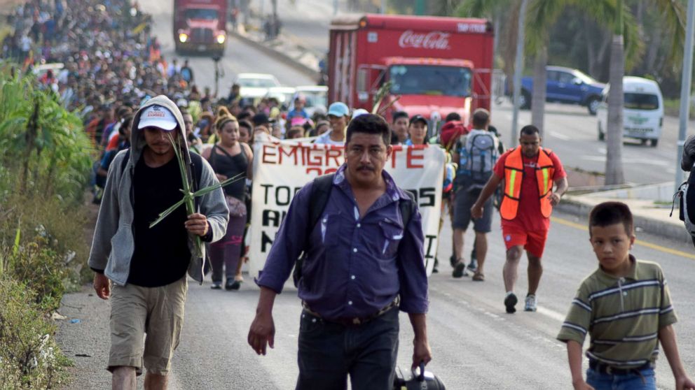 Hundreds of Central Americans attend a mass before they begin a Via Crucis on Palm Sunday from the southern state of Mexico to the center and north of the country, demanding respect for their human rights, asylum and reports of violence in their countries in Tapachula, Mexico, March 25, 2018.
