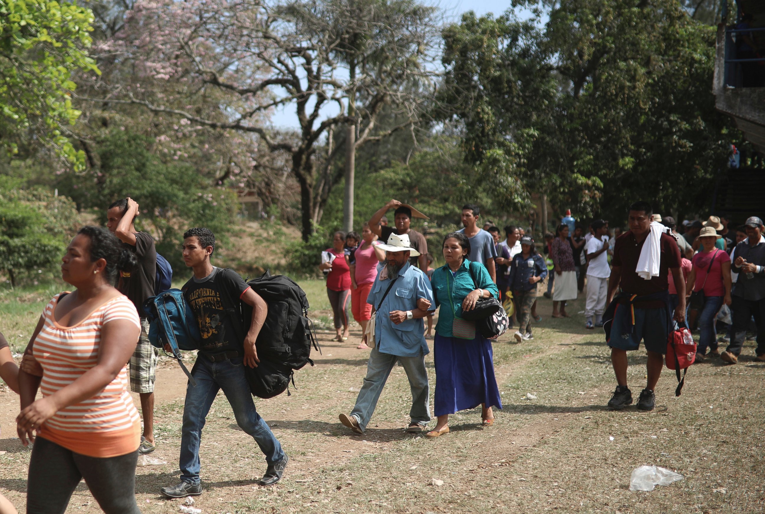 Central American migrants arrive to a sports center during the annual Migrant Stations of the Cross caravan, organized by the "Pueblo Sin Fronteras" activist group, as the group makes a stop in Matias Romero, Oaxaca, Mexico, Monday, April 2, 2018. 