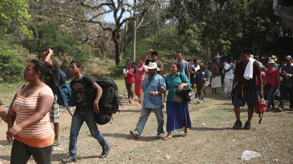 Central American migrants arrive to a sports center during the annual Migrant Stations of the Cross caravan, organized by the "Pueblo Sin Fronteras" activist group, as the group makes a stop in Matias Romero, Oaxaca, Mexico, Monday, April 2, 2018. 
