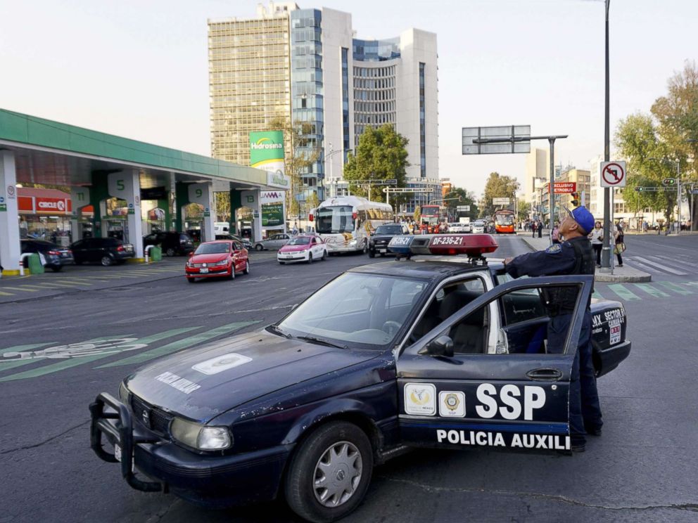 PHOTO: A police car blocks Reforma Avenue during a powerful earthquake in Mexico City, Feb. 16, 2018.