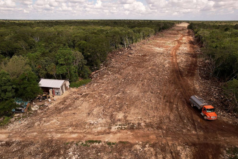 PHOTO: A house stands on the edge of forest which has been cleared for construction of section 5 of the new Mayan Train route, in Solidaridad, Quintana Roo, Mexico, November 6, 2022.