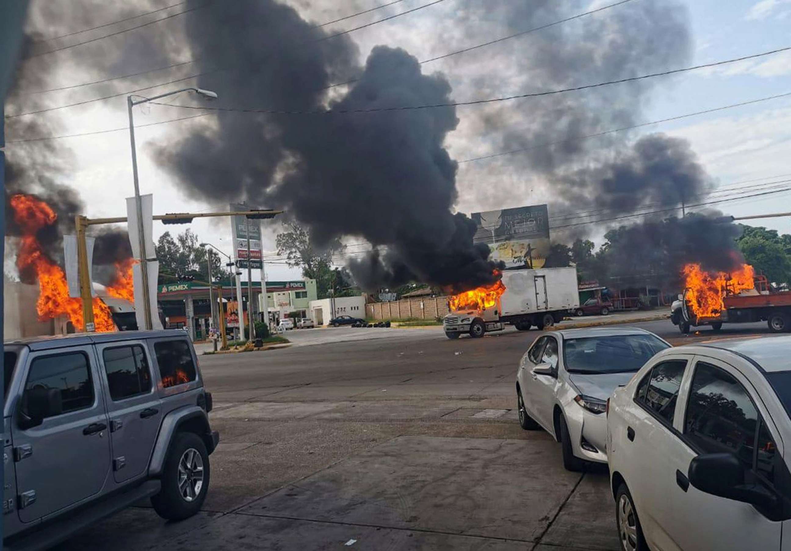 PHOTO: A view of vehicles on fire during a clash between armed gunmen and Federal police and military soldiers, in the streets of the city of Culiacan, Sinaloa state, Mexico, Oct. 17, 2019.