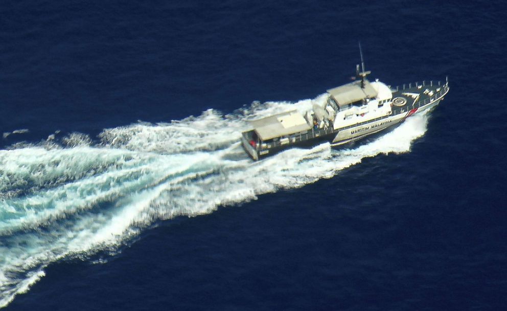 PHOTO: A patrol vessel of Malaysian Maritime Enforcement Agency participates in the search and rescue mission for Malaysia Airlines flight MH370 on March 9, 2014 off the Kelantan coast, Malaysia.