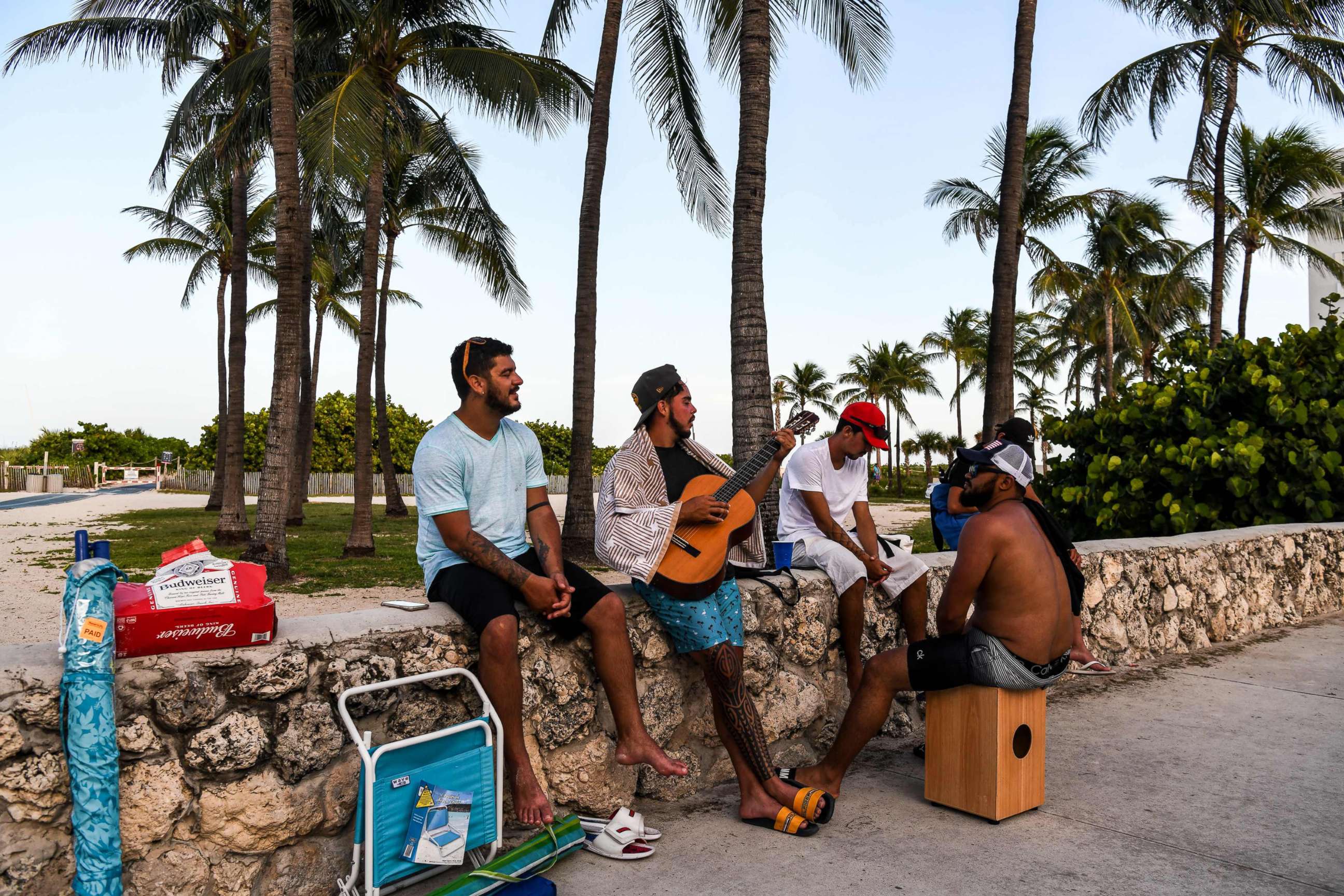 PHOTO: A group of men play music on the beach in Miami Beach, Fla., on July 28, 2020, amid the coronavirus pandemic.