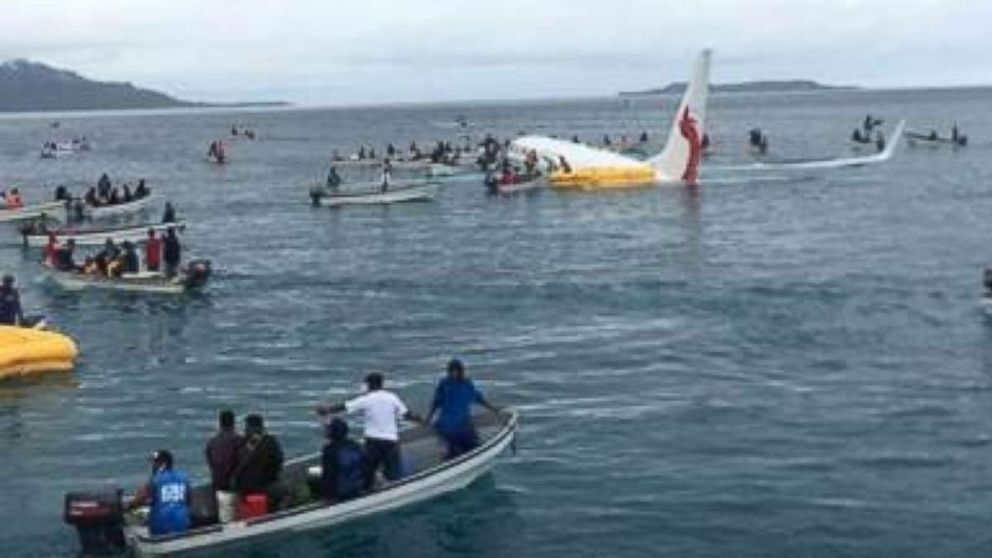 No serious injuries initially were reported after a jet landed short of a runway off the coast of Micronesia.