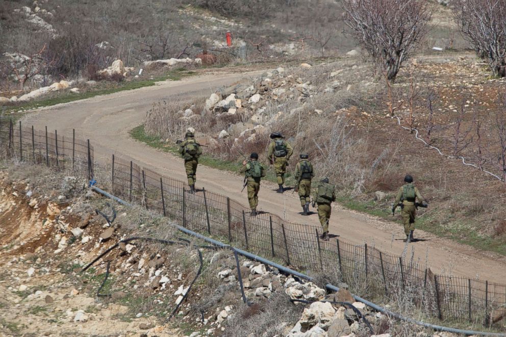 PHOTO: Israeli soldiers patrol in the Israeli controlled Golan Heights, on the border with Syria,  Feb. 18, 2016. 