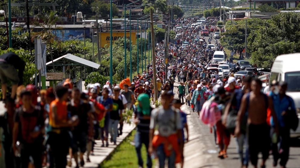 PHOTO: Central American migrants walk along the highway near the border with Guatemala, as they continue their journey trying to reach the U.S., in Tapachula, Mexico, Oct. 21, 2018.